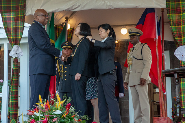 President Tsai Ing-wen is decorated by St. Christopher and Nevis Governor-General Tapley Seaton.