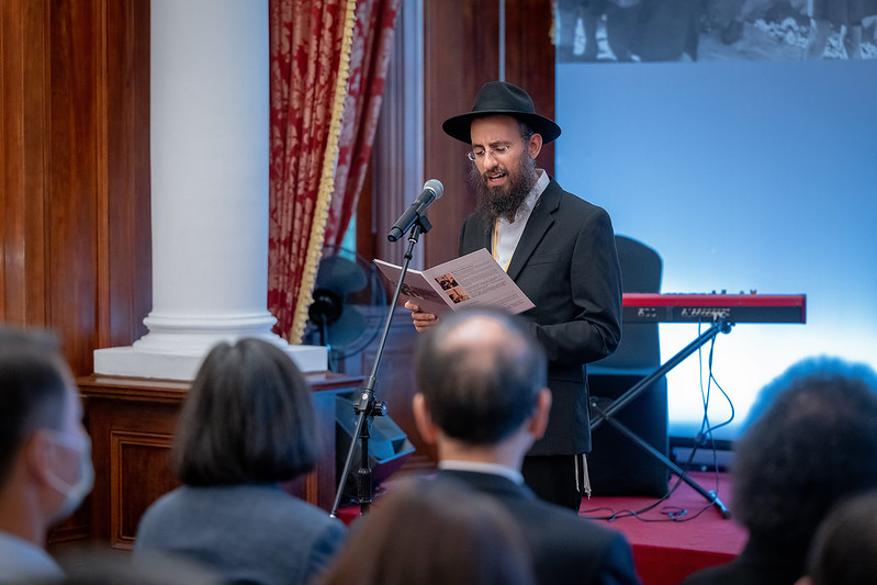 A rabbi recites the prayer "El Male Rachamim."