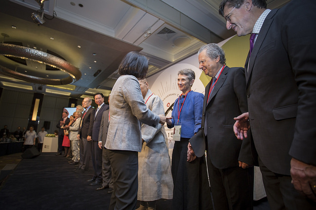 President Tsai shakes hands with participants at an opening ceremony celebrating the 15th anniversary of the Taiwan Foundation for Democracy.