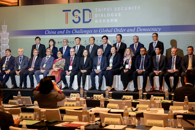 President Tsai Ing-wen poses for a photo with attendees at the opening of the 2023 Taipei Security Dialogue.