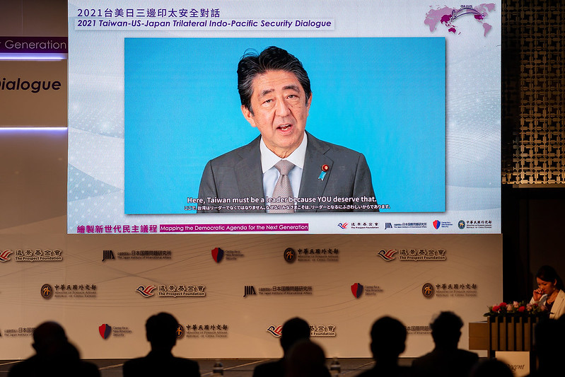Former Japanese Prime Minister Shinzo Abe gives a keynote speech via video.