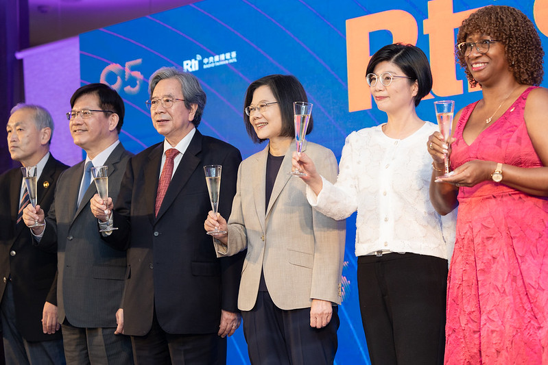 President Tsai Ing-wen raises her glass at a reception marking the 95th anniversary of Radio Taiwan International.