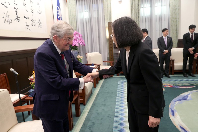 President Tsai Ing-wen shakes hands with co-chair of the APPG Lord Rogan.