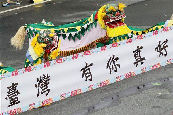 A dragon dance is performed during the 2016 National Day celebration.