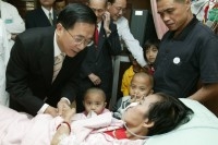 President Chen Visits Bed-ridden Woman.