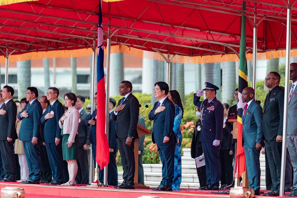 Throughout the playing of the national anthems, the leaders of the two nations stand at attention with their right hands placed over their hearts.