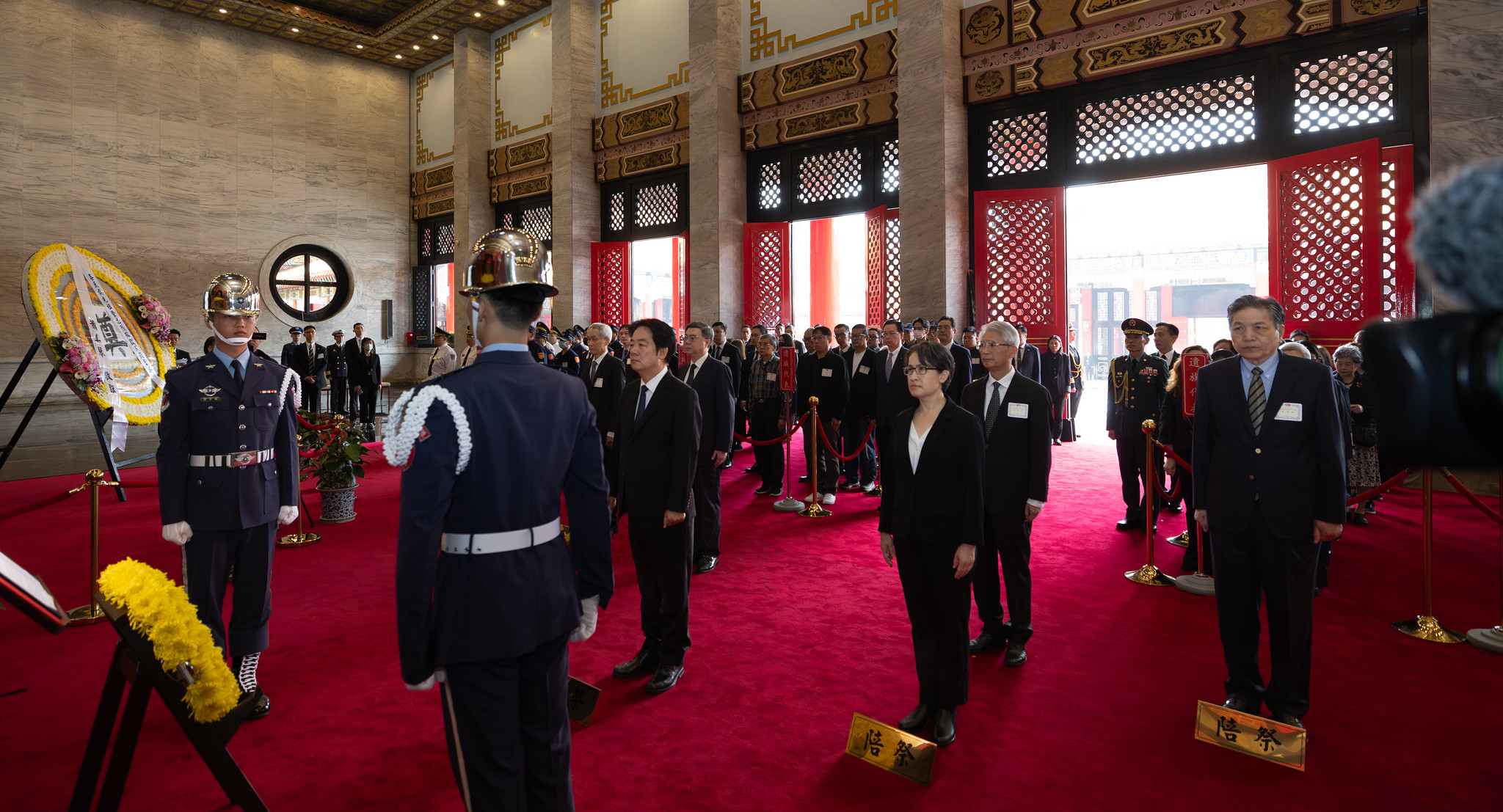 The ceremony at the Sanctuary at the National Revolutionary Martyrs' Shrine is conducted by the President with the accompany of the Vice President and the presidents of the five branches of the ROC government.